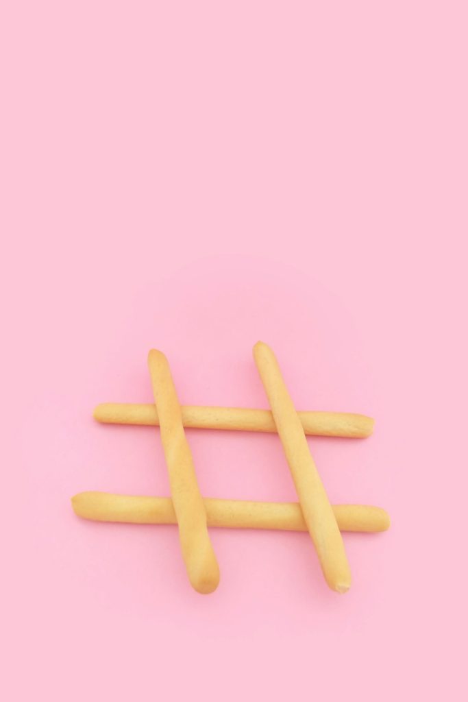 four-brown-wooden-sticks-on-pink-surface-yjwbvwmjs5m four-brown-wooden-sticks-on-pink-surface-yjwbvwmjs5m